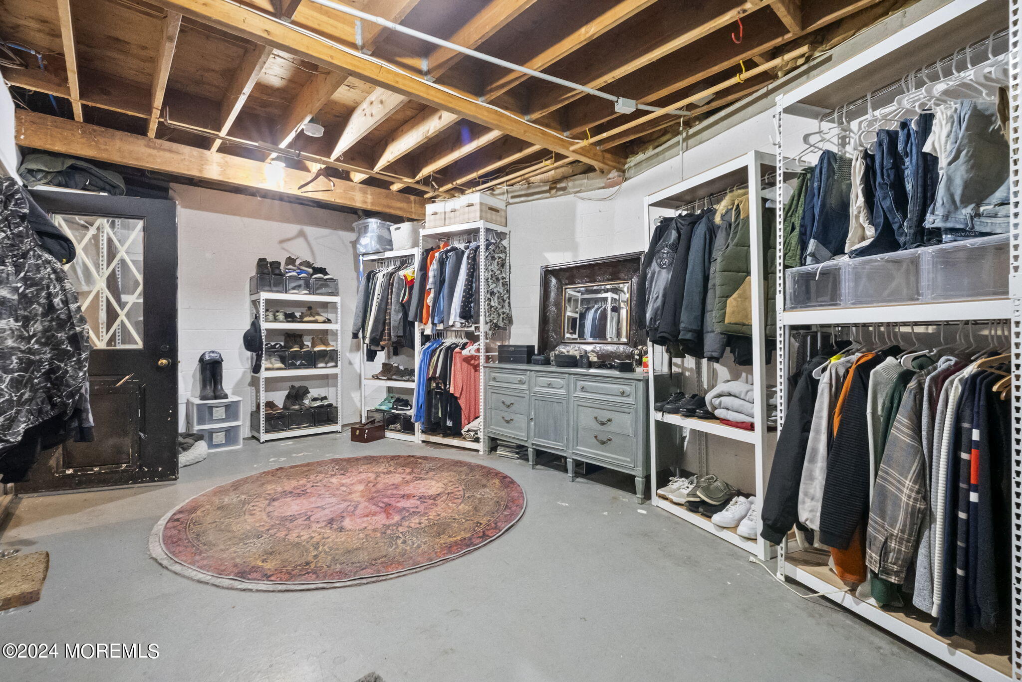151 Summerfield Road Belvidere, NJ 07823 - Photo 31 of 41 a view of walk in closet with clothes and shoes