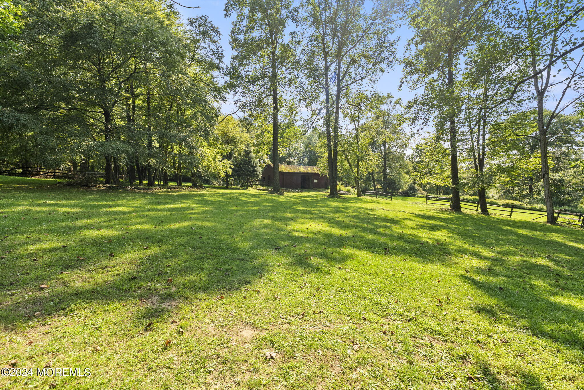 151 Summerfield Road Belvidere, NJ 07823 - Photo 38 of 41 a big yard with trees in the background