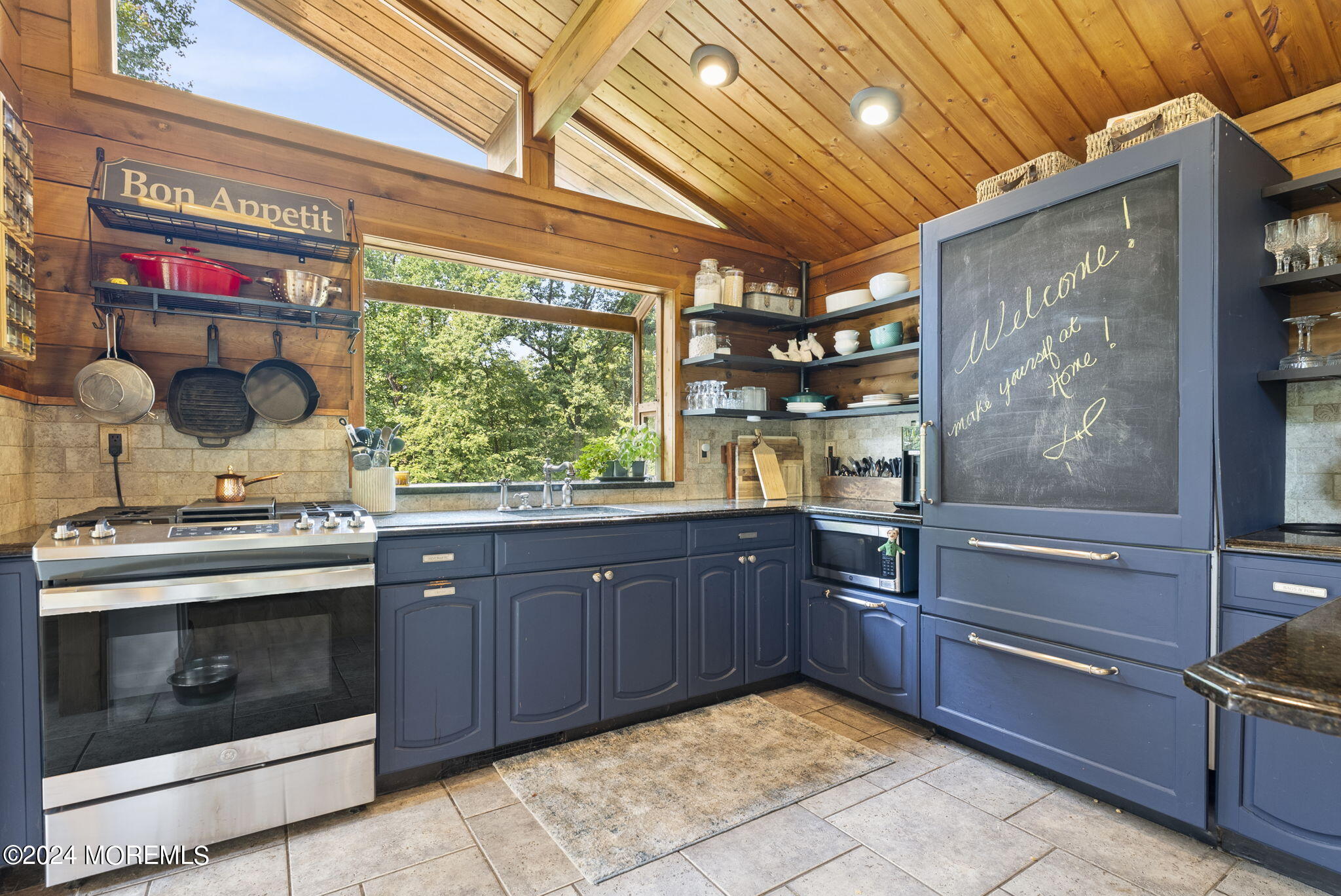 151 Summerfield Road Belvidere, NJ 07823 - Photo 6 of 41 a kitchen with wooden cabinets and stainless steel appliances