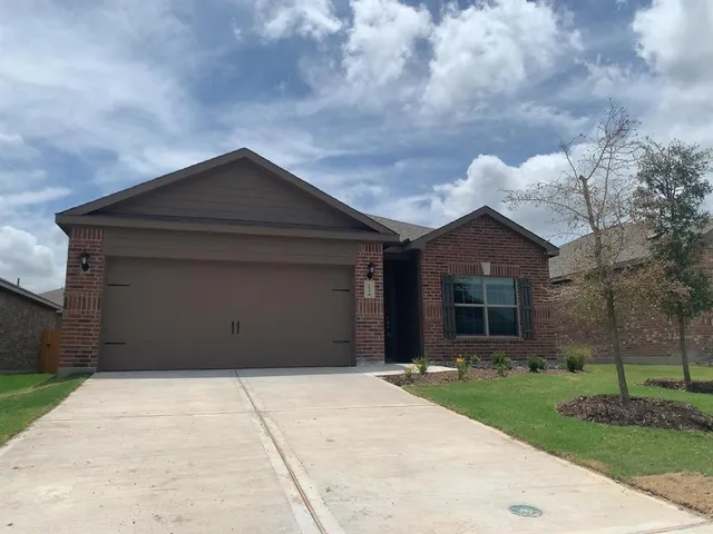 a house with trees in front of it
