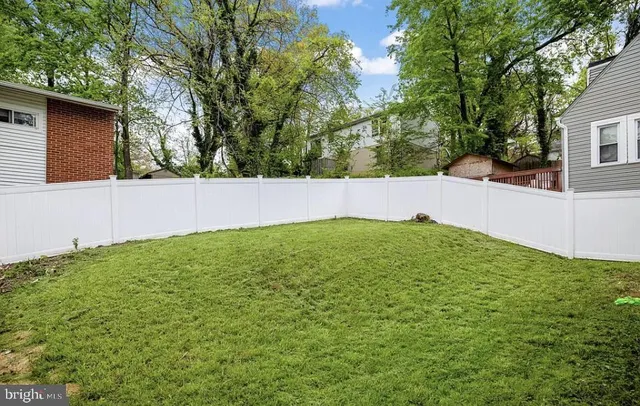 a view of yard with large tree