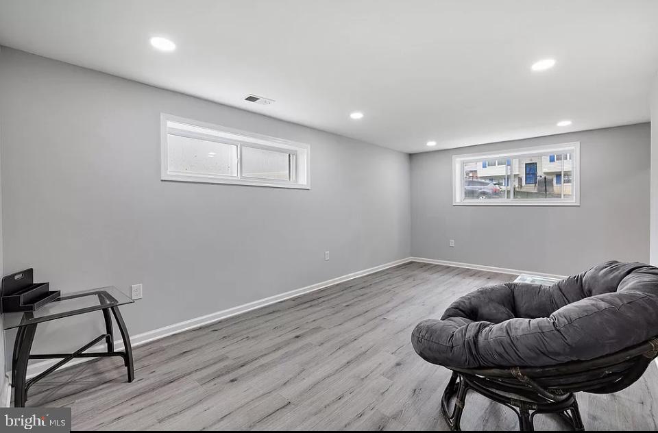 4616 Heath Street, Unit B Capitol Heights, MD 20743 - Photo 21 of 25 a living room with furniture and a wooden floor