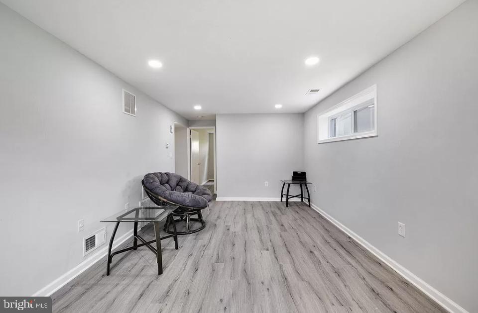 4616 Heath Street, Unit B Capitol Heights, MD 20743 - Photo 22 of 25 a view of a workspace with furniture and wooden floor