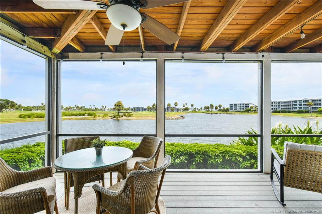 311 Golfview Circle Stuart, FL 34996 - Photo 27 of 37 a view of a dining room with furniture window and outside view