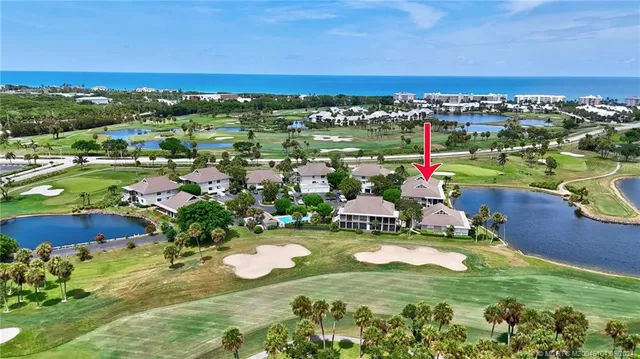 a bird view of building and lake view