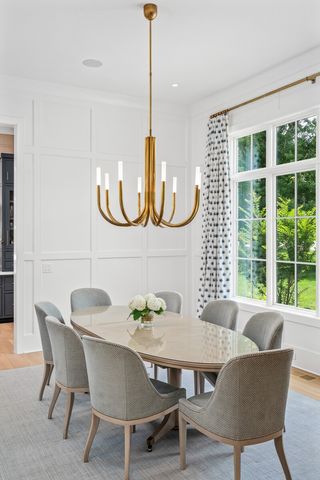 a spacious bathroom with a sink double vanity and a mirror