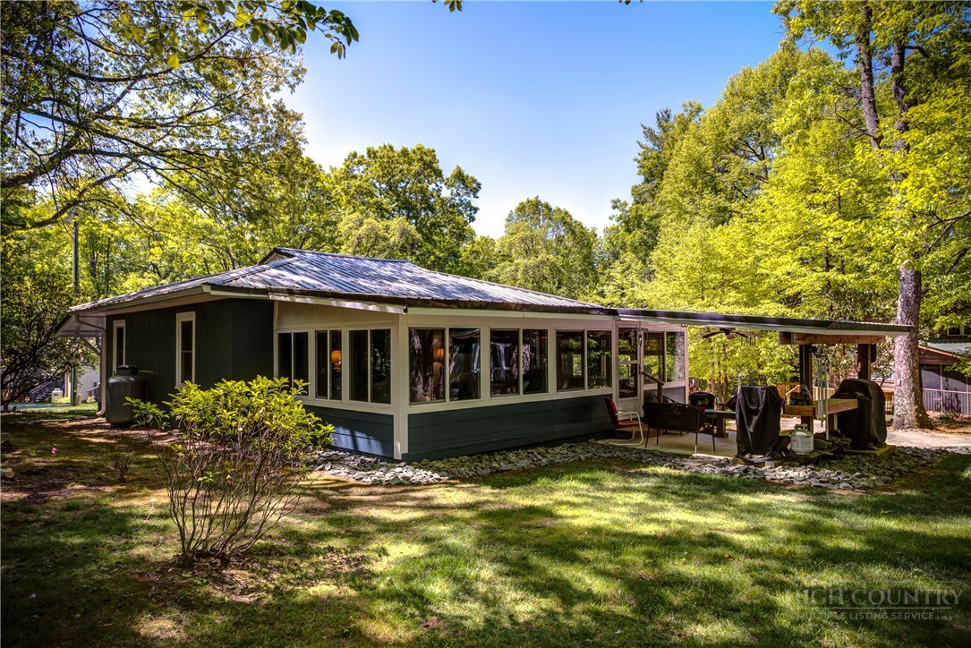 1010 Rash Road Glade Valley, NC 28627 - Photo 1 of 50 a view of a house with a yard