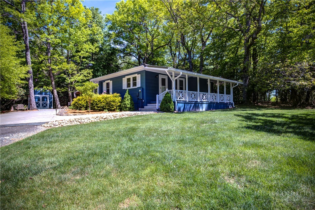 1010 Rash Road Glade Valley, NC 28627 - Photo 2 of 50 a view of a house with a yard