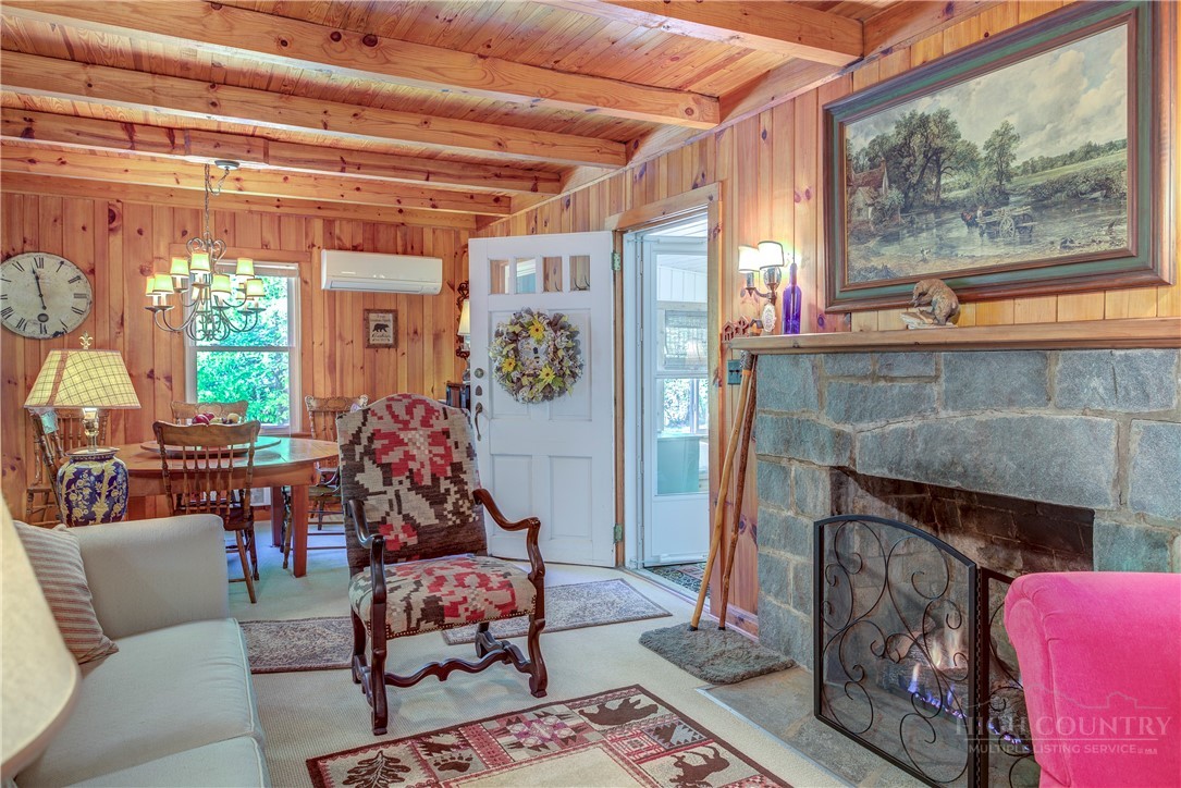 1010 Rash Road Glade Valley, NC 28627 - Photo 26 of 50 a living room with furniture and a fireplace