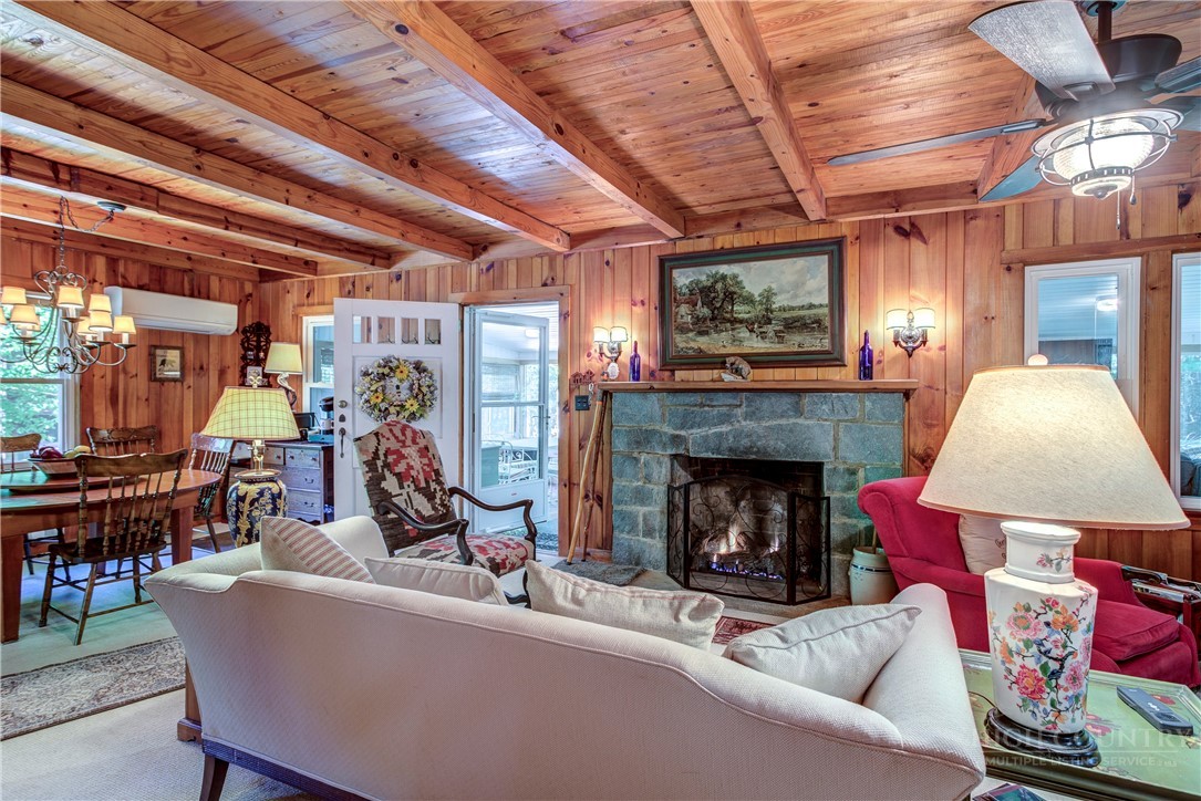 1010 Rash Road Glade Valley, NC 28627 - Photo 29 of 50 a living room with furniture and a fireplace