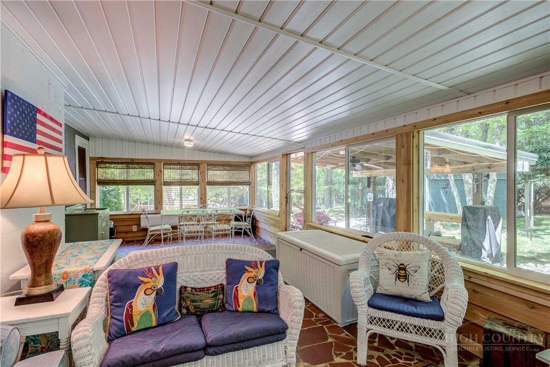 1010 Rash Road Glade Valley, NC 28627 - Photo 36 of 50 a living room with furniture and a large window