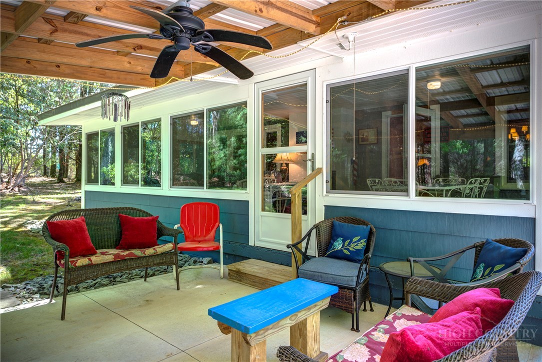 1010 Rash Road Glade Valley, NC 28627 - Photo 45 of 50 a building outdoor space with patio furniture