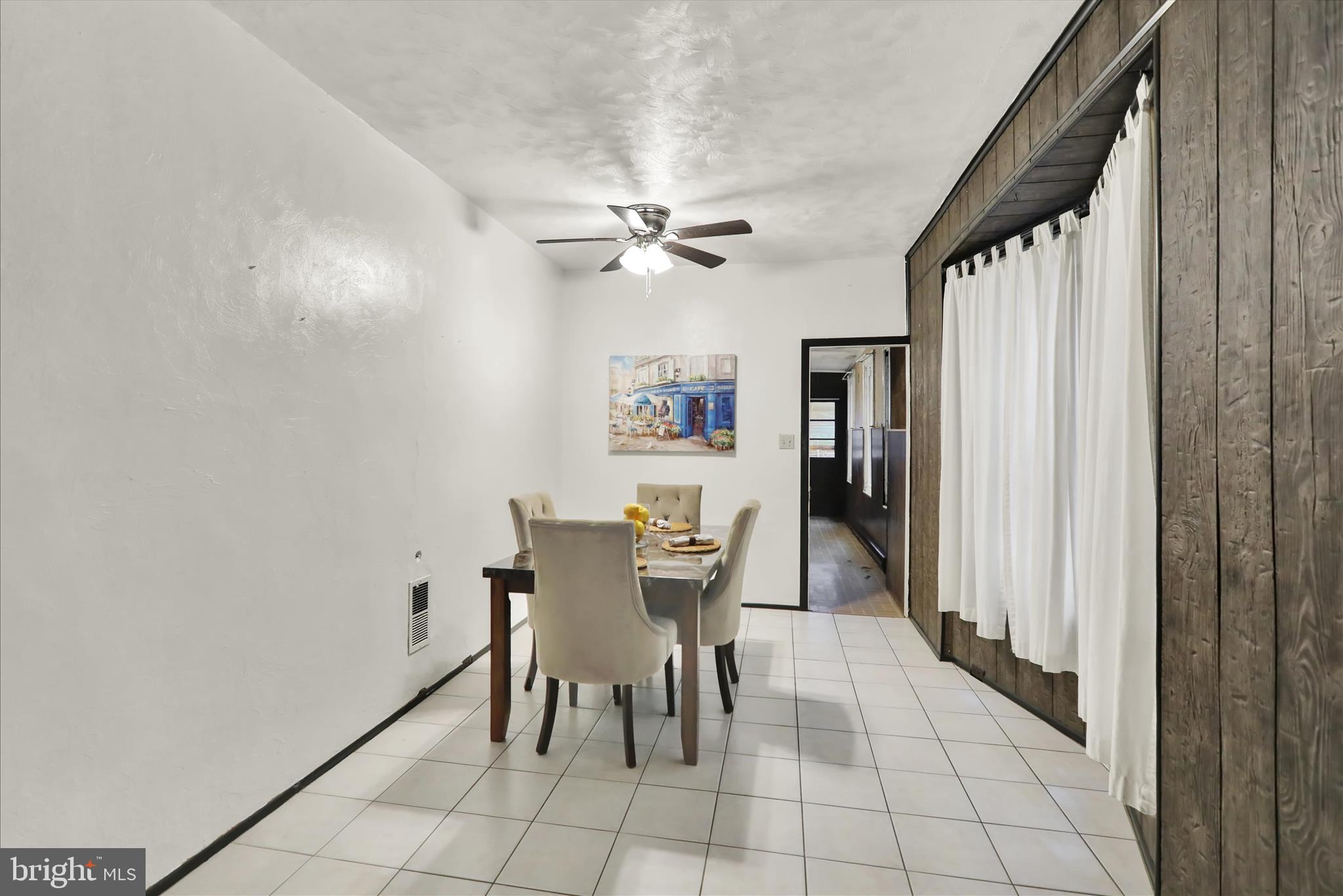 1217 Windsor Street Reading, PA 19604 - Photo 11 of 38 a view of a dining room with furniture