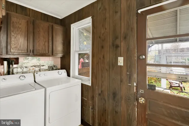 a room with dryer and washer
