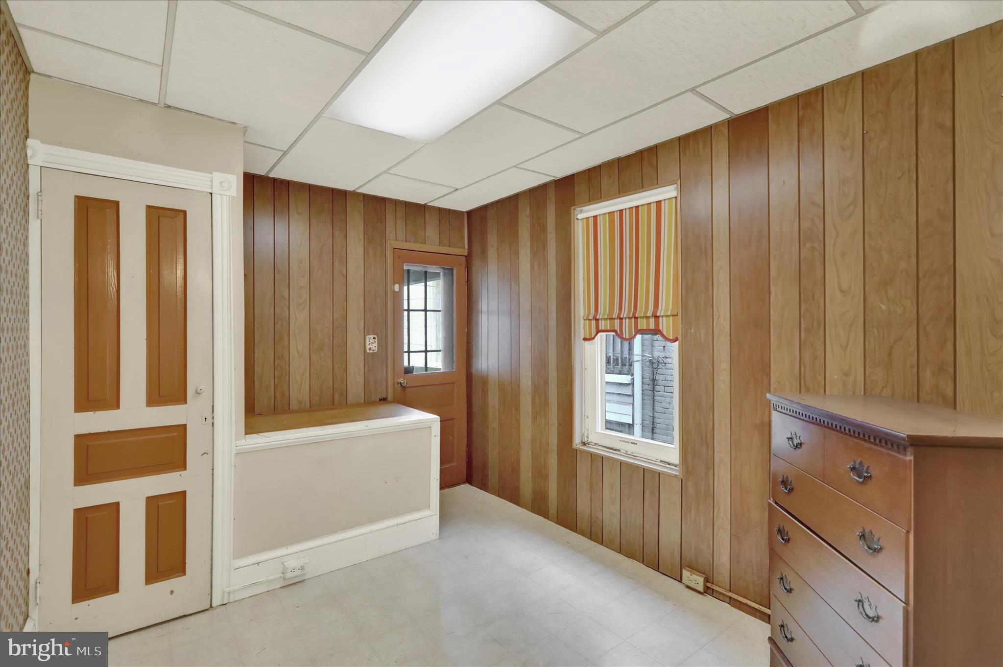 1217 Windsor Street Reading, PA 19604 - Photo 22 of 38 a view of an empty room and window