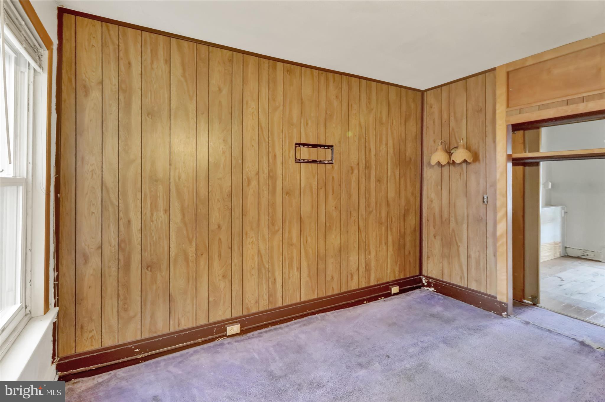 1217 Windsor Street Reading, PA 19604 - Photo 24 of 38 an empty room with a wooden door