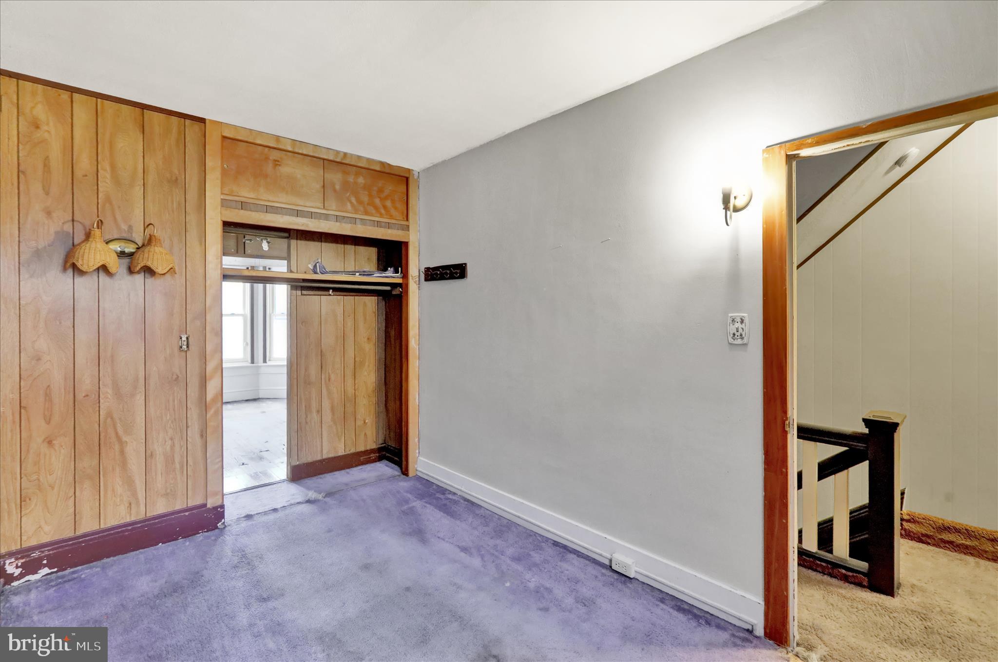 1217 Windsor Street Reading, PA 19604 - Photo 25 of 38 a view of a hallway with wooden floor and closet