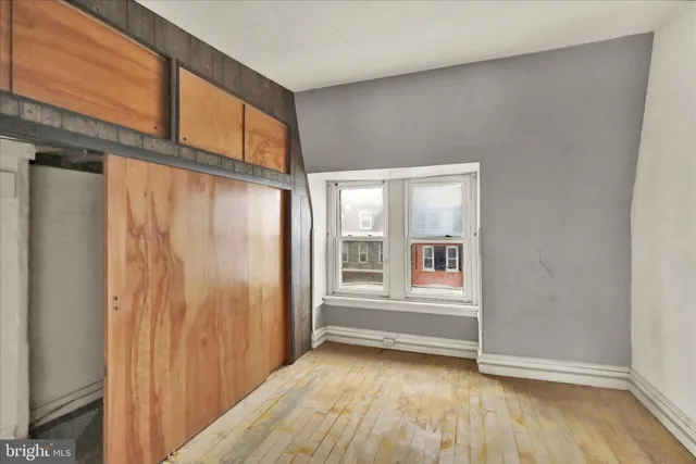 a utility room with cabinets