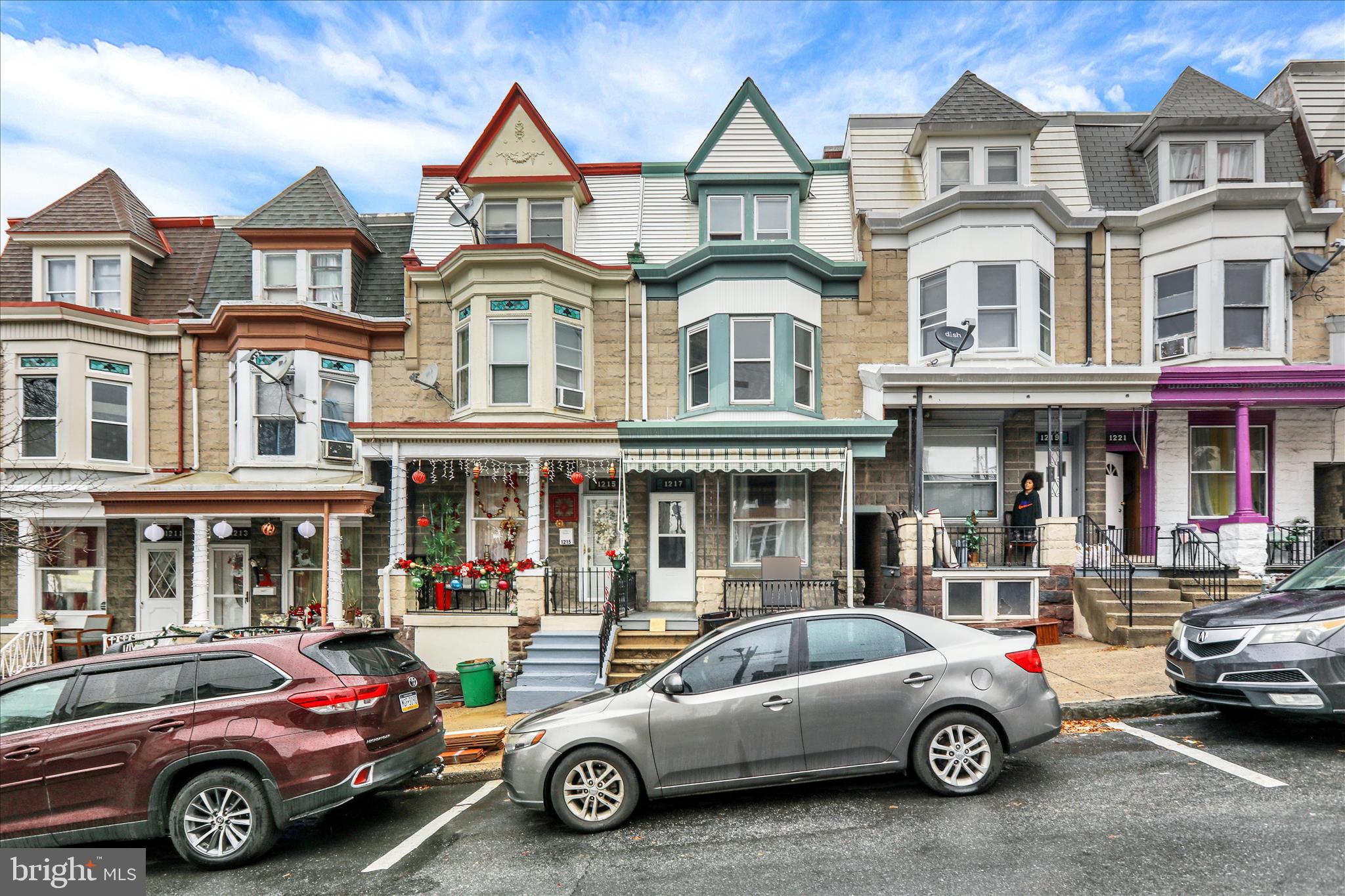 1217 Windsor Street Reading, PA 19604 - Photo 34 of 38 a car parked in front of a house