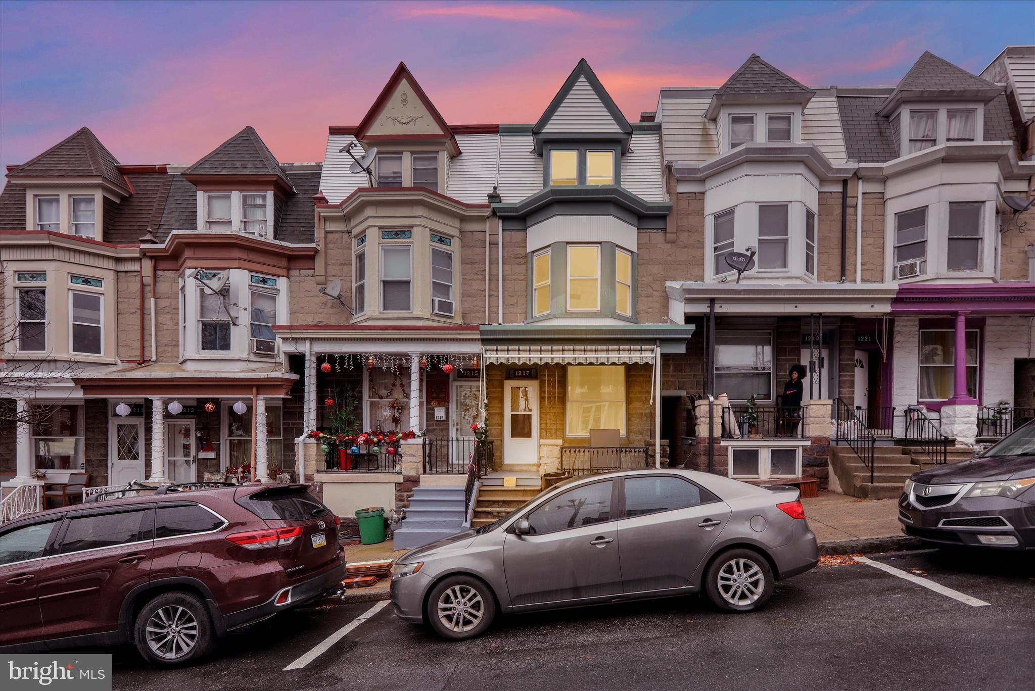 1217 Windsor Street Reading, PA 19604 - Photo 35 of 38 a car parked in front of a houses