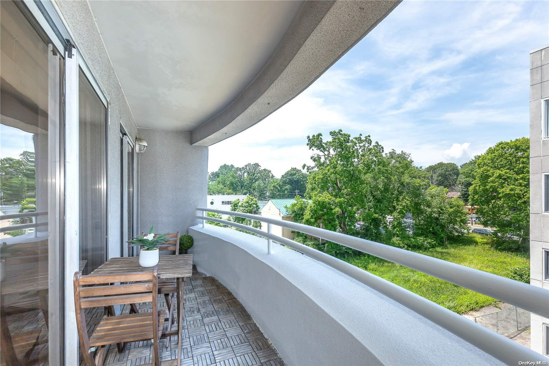 a view of balcony with furniture