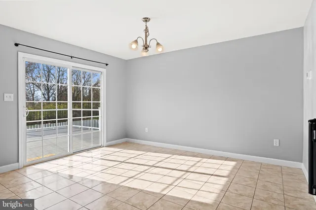 a kitchen with a sink stove top oven and cabinets