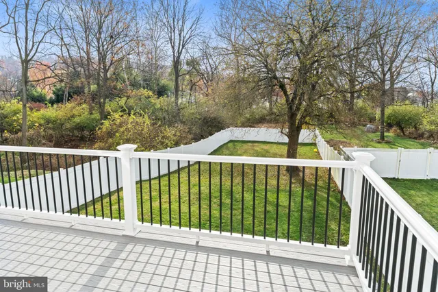 a view of a room with wooden walls