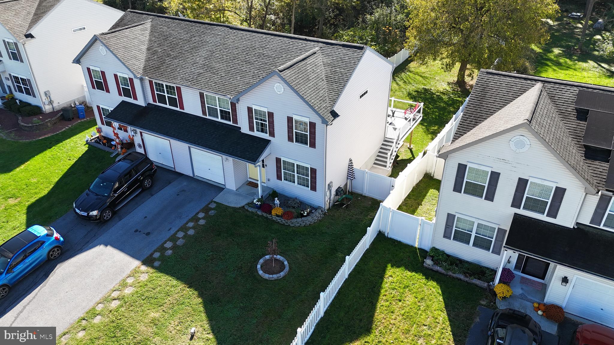 1014 Daisy Drive Temple, PA 19560 - Photo 4 of 83 an aerial view of a house with swimming pool garden and patio