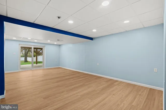 a view of a chandelier fan in a room