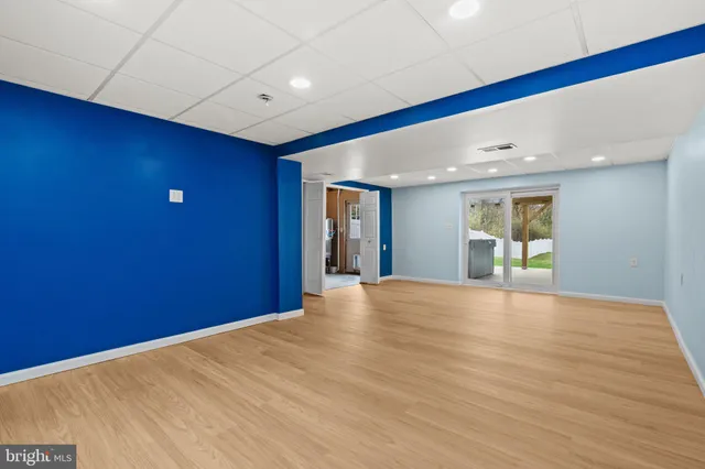 an empty room with windows