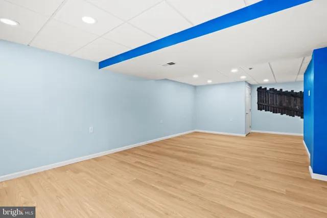 a bathroom with a sink vanity and a mirror