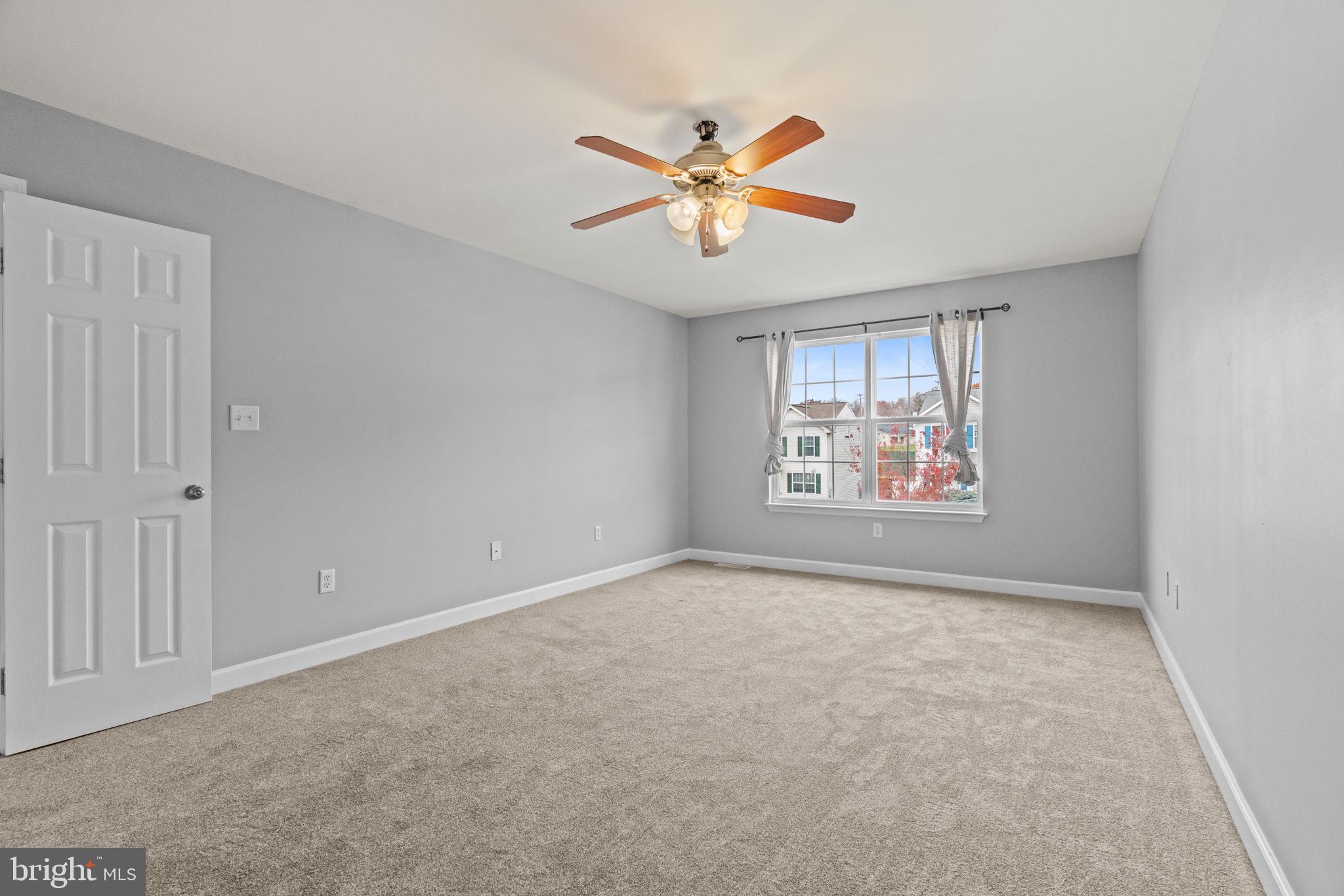 1014 Daisy Drive Temple, PA 19560 - Photo 57 of 83 a view of an empty room with a window
