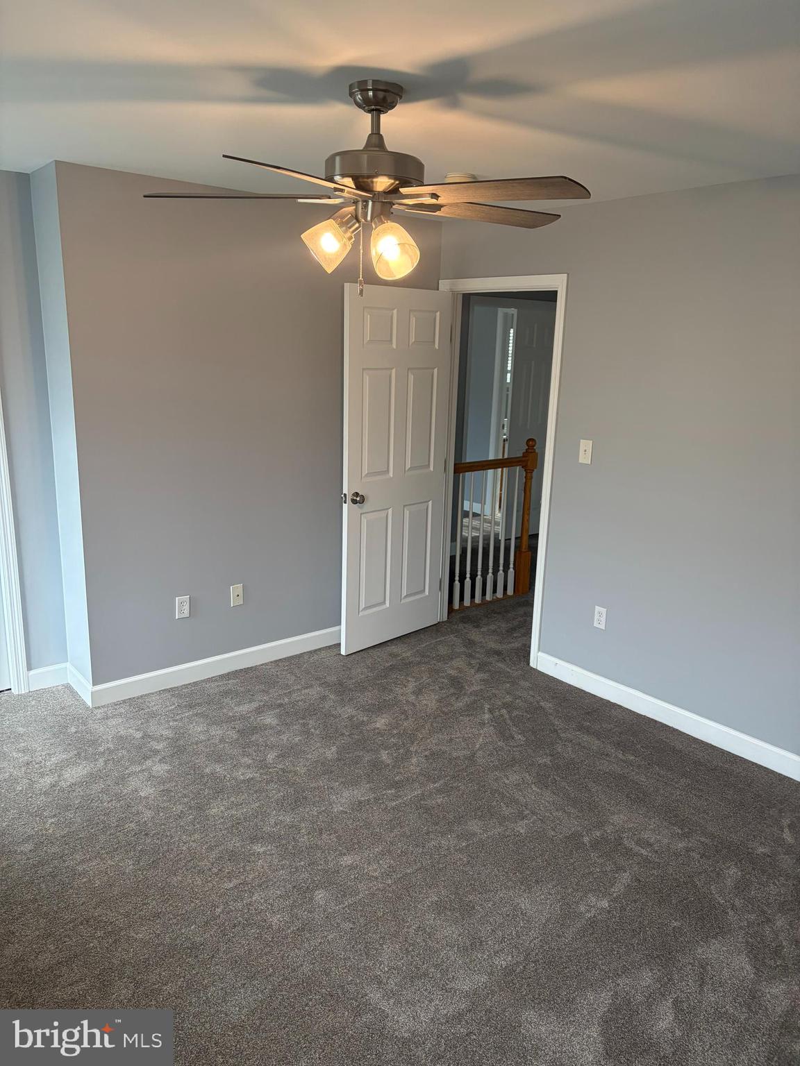 1014 Daisy Drive Temple, PA 19560 - Photo 64 of 83 a view of an empty room with a chandelier fan
