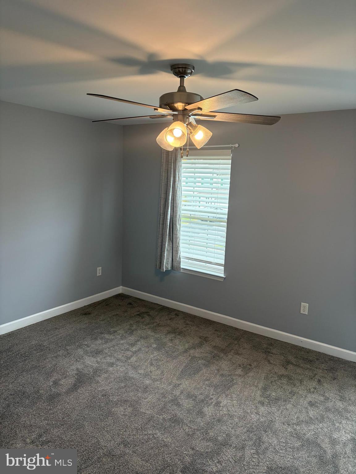 1014 Daisy Drive Temple, PA 19560 - Photo 66 of 83 a view of a chandelier fan in a room