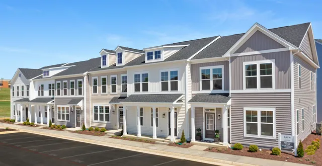 a front view of a building with a street