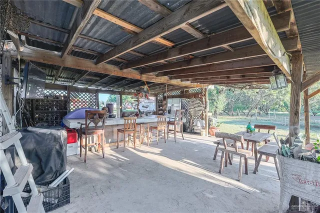 a view of a yard with a tree