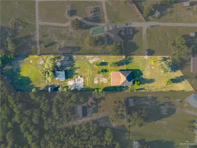 a picture of a bathroom with mirror