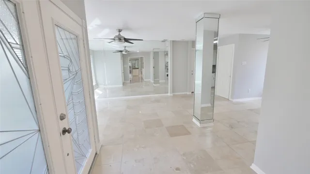 a kitchen with stainless steel appliances granite countertop a refrigerator sink and cabinets