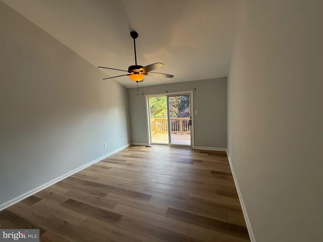 a view of an empty room with window