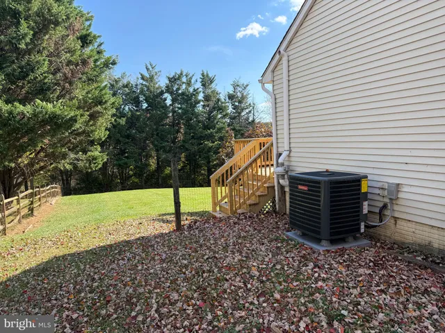 a view of a room with a wooden walls