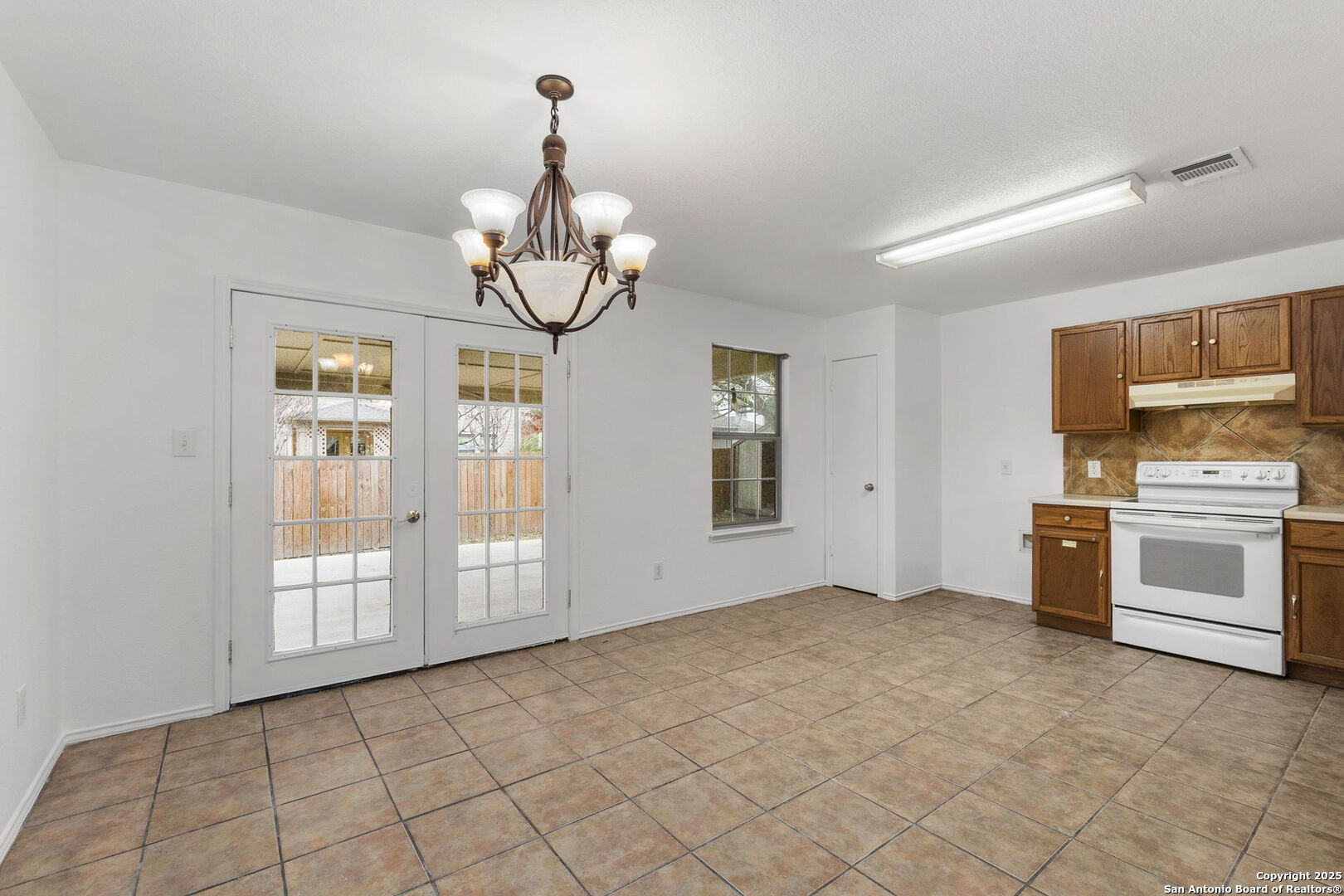 620 Waterleaf Boulevard Kyle, TX 78640 - Photo 16 of 34 a view of an empty room with a window