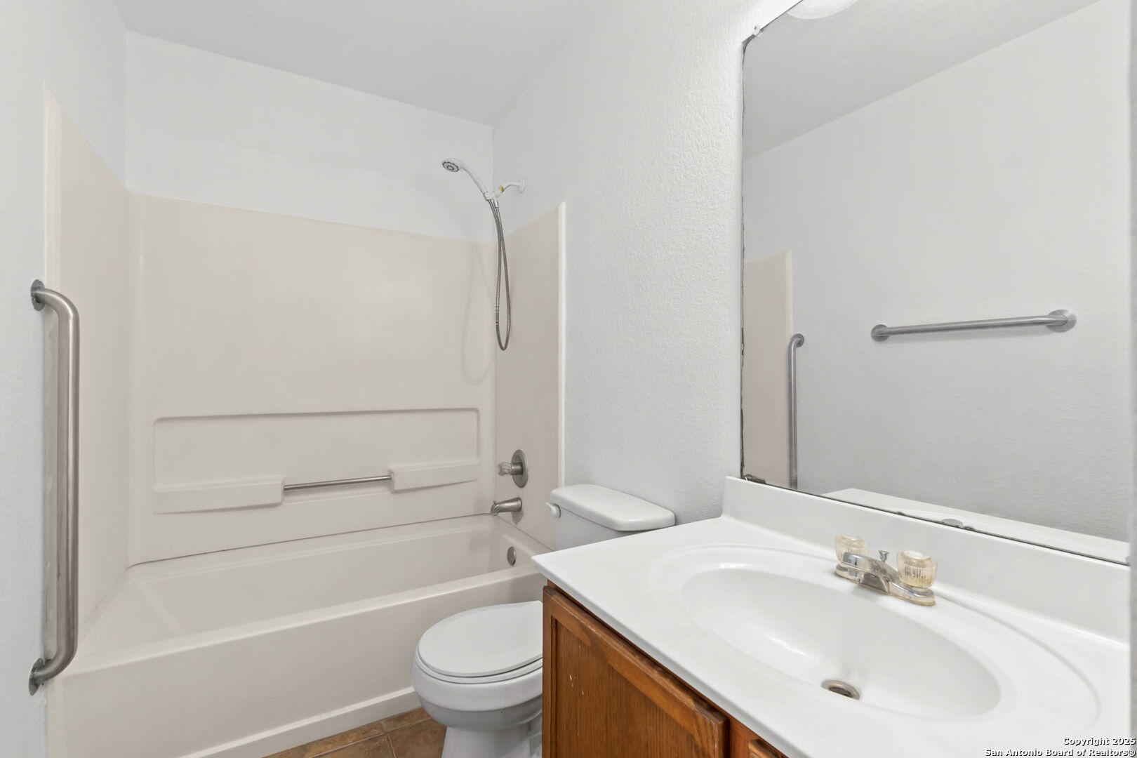 620 Waterleaf Boulevard Kyle, TX 78640 - Photo 30 of 34 a bathroom with a sink toilet and shower
