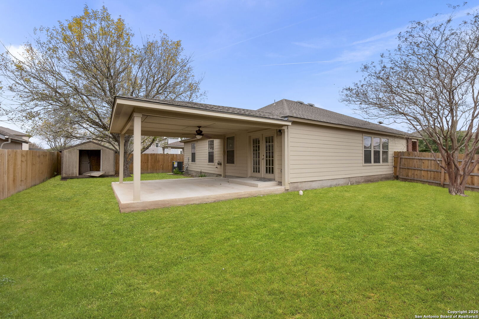 620 Waterleaf Boulevard Kyle, TX 78640 - Photo 33 of 34 a view of a house with a yard and sitting area