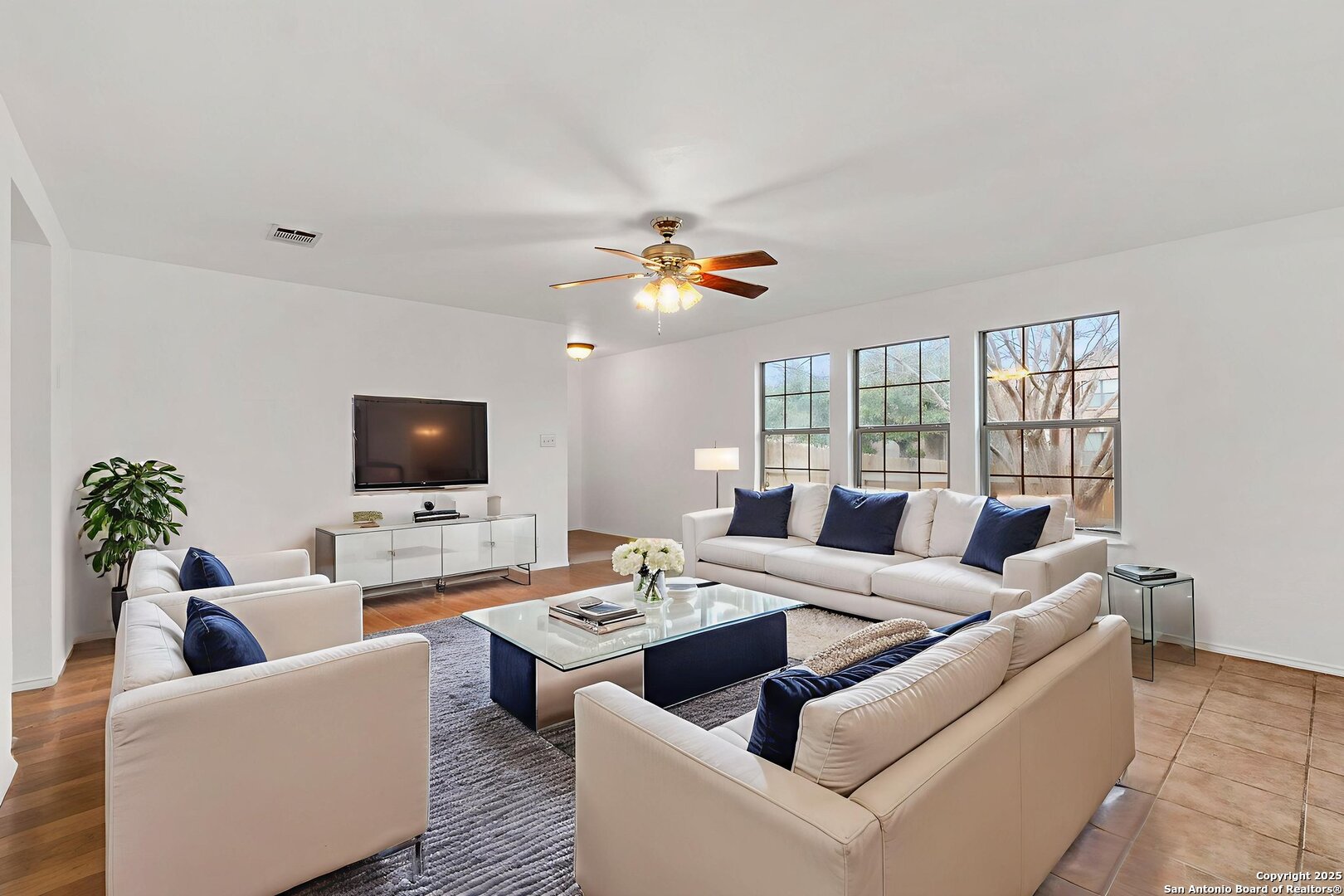 620 Waterleaf Boulevard Kyle, TX 78640 - Photo 7 of 34 a living room with furniture and a flat screen tv