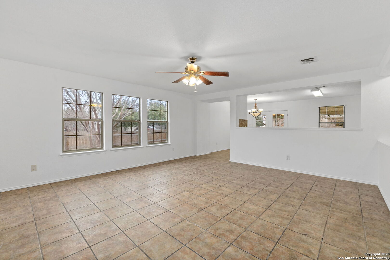 620 Waterleaf Boulevard Kyle, TX 78640 - Photo 8 of 34 a view of an empty room with window