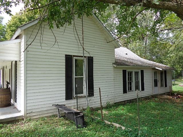 109 Cascade Hollow Road Normandy, TN 37360 - Photo 2 of 12 a view of a house with a backyard