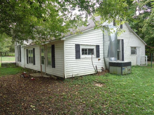 109 Cascade Hollow Road Normandy, TN 37360 - Photo 4 of 12 a view of a house with a yard