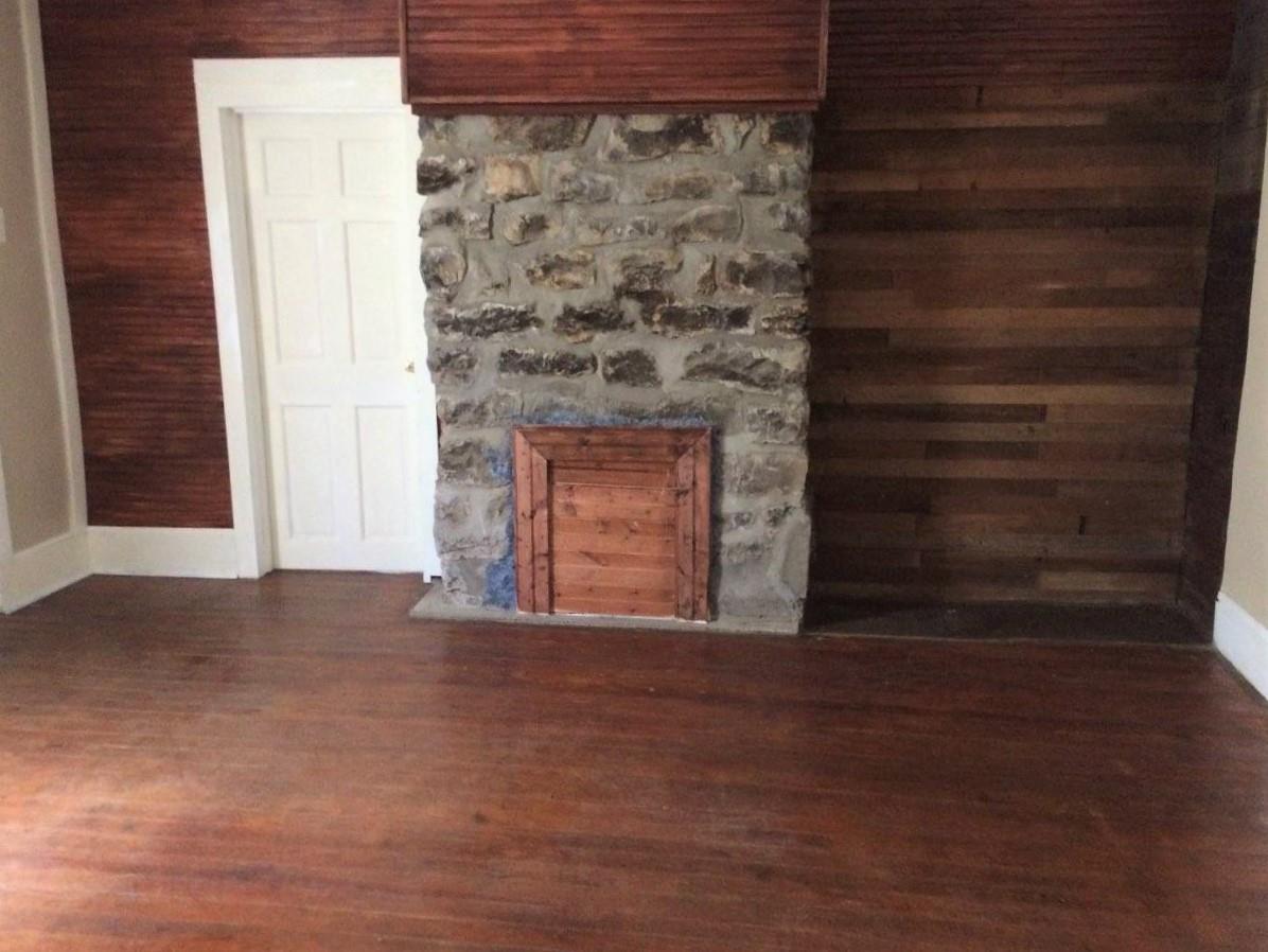 109 Cascade Hollow Road Normandy, TN 37360 - Photo 9 of 12 a view of empty room with wooden floor