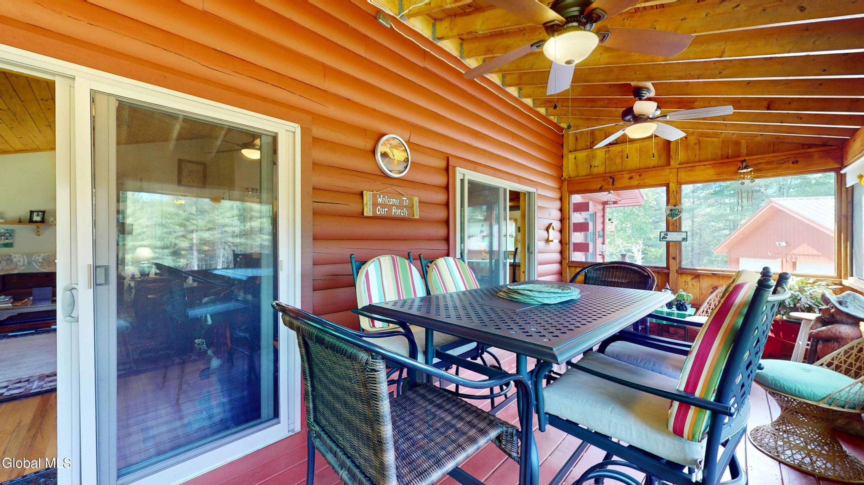 754 Church Road Minerva, NY 12857 - Photo 19 of 55 screened porch