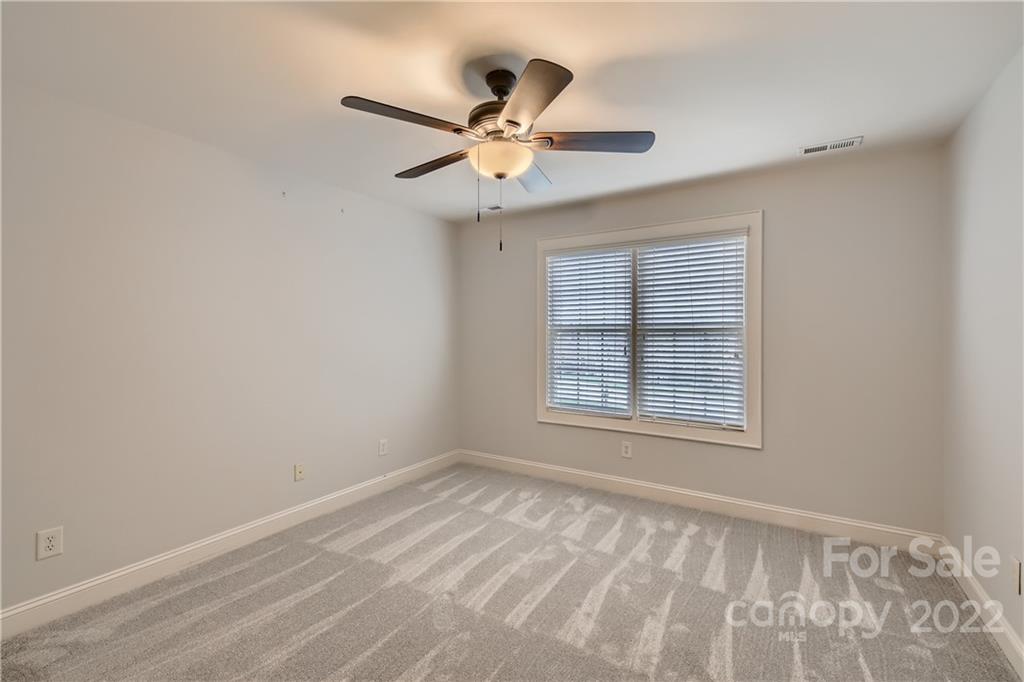 7653 Juniper Lane Denver, NC 28037 - Photo 15 of 28 a view of an empty room with a window